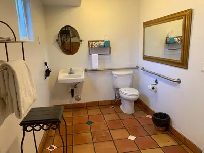 a bathroom with a toilet and a sink at Chantico Inn in Ojai