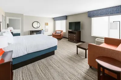 a hotel room with a large bed and a television at Hampton Inn & Suites Thousand Oaks in Thousand Oaks