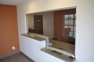 a mirror on a wall in a room at Motel 6 Maple/Main in Hesperia