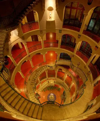 an overhead view of a spiral staircase in a building at The Mission Inn Hotel and Spa in Riverside