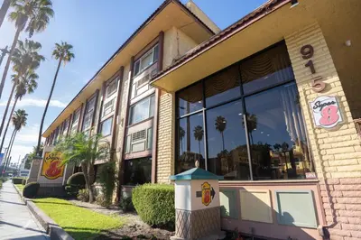 a building with a bird house in front of it at Super 8 by Wyndham Anaheim/Disneyland Drive in Anaheim