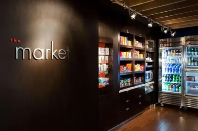 a store with a market sign on the side of a refrigerator at Sonesta Select Los Angeles LAX El Segundo in El Segundo