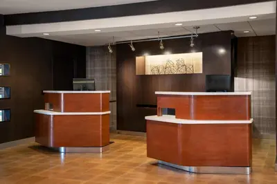 a lobby with a reception desk and a television at Courtyard by Marriott Los Angeles Hacienda Heights Orange County in Hacienda Heights