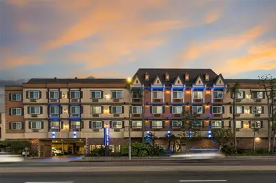 a building with blue lights on the side of a street at Best Western Airpark Hotel - LAX Airport LA Stadium in Inglewood