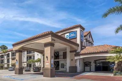 a hotel building with a sign in front of it at Best Western Redondo Beach Galleria Hotel - Beach City LA in Redondo Beach