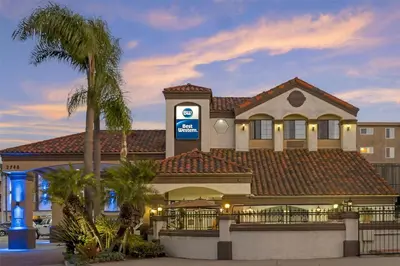 a hotel with a sign on the front of a building at Best Western Redondo Beach Galleria Hotel - Beach City LA in Redondo Beach