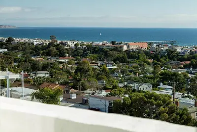 an aerial view of a city with the ocean at Hotel Hermosa in Hermosa Beach