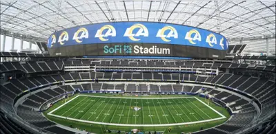 an empty stadium with a football game in it at Century Inn at LAX in Inglewood