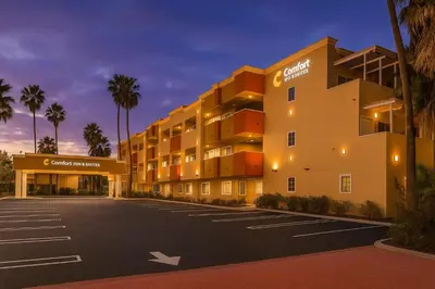 an empty parking lot in front of a hotel at Comfort Inn & Suites Huntington Beach in Huntington Beach