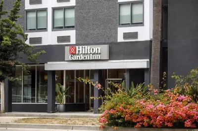a building with a sign for the hilton garden inn at Hilton Garden Inn LAX Los Angeles Airport in Los Angeles