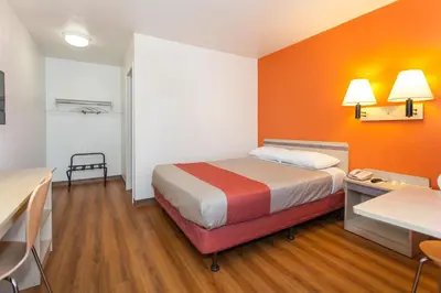 a motel room with a bed and a desk at Motel 6-Rosemead, CA - Los Angeles in Rosemead