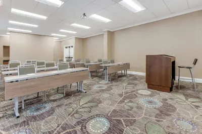 a classroom with desks and chairs in a room at Sonesta Anaheim Resort Area in Anaheim