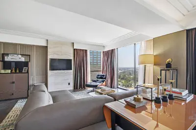 a living room with a couch and a table at Sheraton Universal in Los Angeles