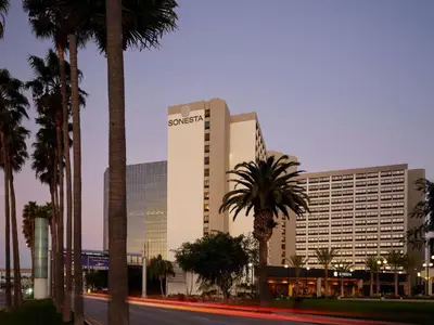 a sony building with palm trees in front of it at Sonesta Los Angeles Airport LAX in Los Angeles