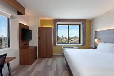 a hotel room with a bed and a television at Holiday Inn Express Los Angeles LAX Airport by IHG in Los Angeles