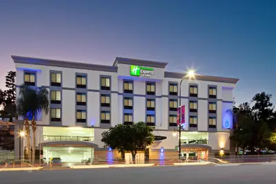 a hotel with a sign on the front of it at Holiday Inn Express Hollywood Walk of Fame by IHG in Los Angeles