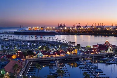 a view of a harbor at night with a cruise ship at Hyatt Regency Long Beach in Long Beach