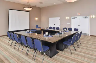 a large conference room with a large table and chairs at Holiday Inn Express Hotel & Suites Ventura Harbor by IHG in Ventura