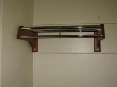 a metal shelf on a wall in a room at Royal Inn Motel Long Beach in Long Beach
