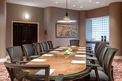 a conference room with a long table and chairs at Holiday Inn Los Angeles Gateway-Torrance by IHG in Torrance