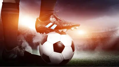 a soccer player is standing on a soccer ball at Holiday Inn Los Angeles Gateway-Torrance by IHG in Torrance