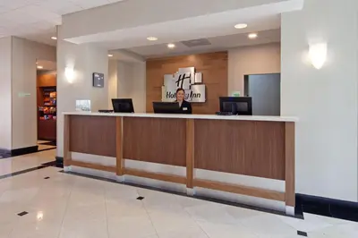 a lobby of a hospital with a reception desk at Holiday Inn Palmdale-Lancaster by IHG in Palmdale