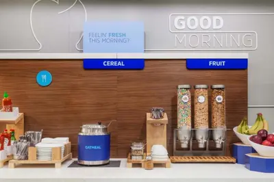 a grocery store with food items on a counter at Holiday Inn Express Hotel & Suites Hesperia by IHG in Hesperia