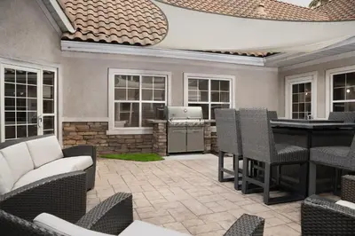 an outdoor patio with a table and chairs at Residence Inn by Marriott San Bernardino in San Bernardino