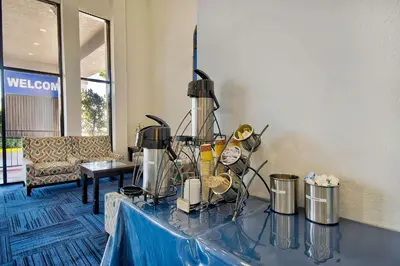a room with a table with items on it at Studio 6 Suites Lawndale, CA South Bay in Lawndale