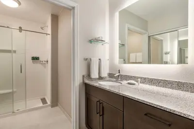a bathroom with a sink and a shower at Residence Inn by Marriott Palmdale Lancaster in Palmdale