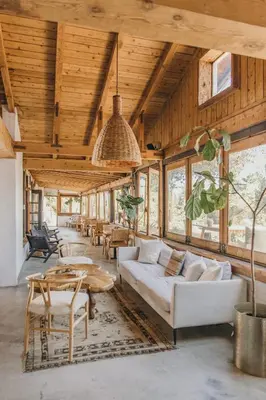 a living room with a couch and a table at CALAMIGOS RANCH Resort & Spa in Malibu