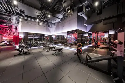 a gym with several treadmills and machines at InterContinental - Los Angeles Downtown by IHG in Los Angeles