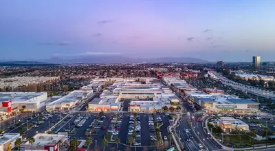 an aerial view of a parking lot with cars at Staybridge Suites Oxnard - River Ridge by IHG in Oxnard