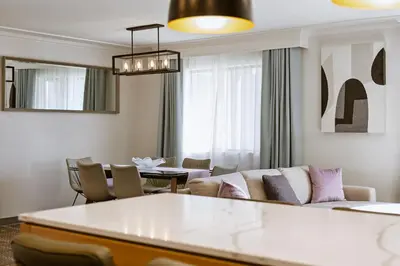 a living room with a couch and a table at Staybridge Suites Oxnard - River Ridge by IHG in Oxnard