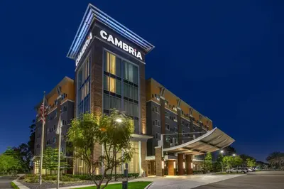 a hotel building with a sign on top of it at Cambria Hotel LAX in El Segundo