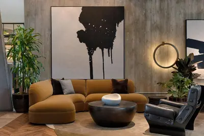 a living room with a couch and a table at Kimpton La Peer Hotel West Hollywood by IHG in Los Angeles