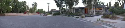 a street with a house on the side of the road at Artistic Resort Like Home with Pool in Fullerton