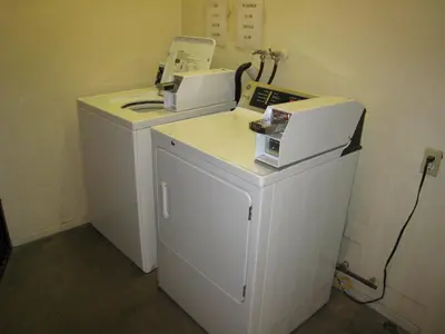 a washer and dryer in a room at Town House Motel in Lancaster