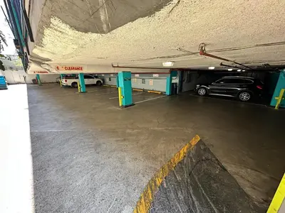a parking garage with a car parked in it at Quality Inn Near Hollywood Walk of Fame in Los Angeles