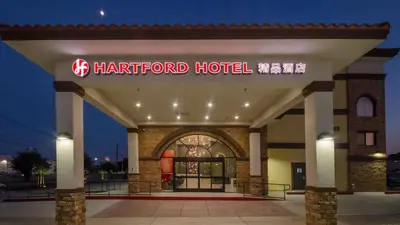 a hardford hotel sign on the front of a building at Hartford Hotel Best Western Signature Collection in Rosemead