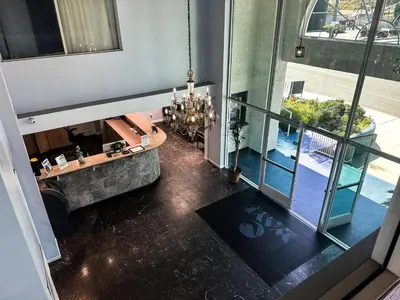 an overhead view of a room with a living room at Wave Hotel Manhattan Beach in Manhattan Beach