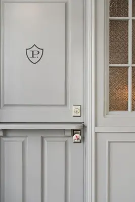 a white door with a window on it at Palihotel Westwood Village - West Beverly Hills in Los Angeles