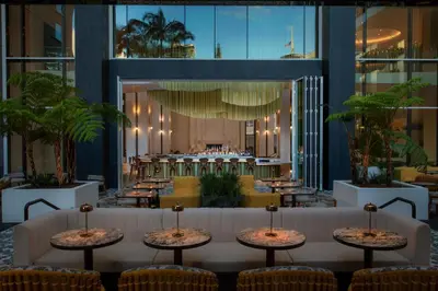 a view of a restaurant with tables and chairs at W Hollywood in Los Angeles