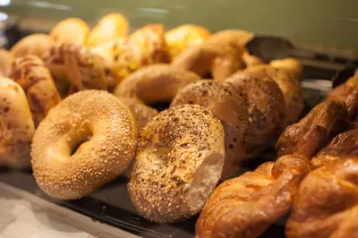 a bunch of different types of donuts and pastries at Kawada Hotel in Los Angeles