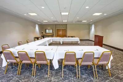 a large conference room with a large table and chairs at Homewood Suites Bakersfield in Bakersfield