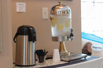 a blender sitting on a counter next to a coffee pot at Channel Island Shores in Oxnard