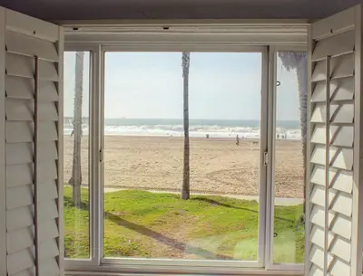 a window with a view of the beach at Venice on the Beach Hotel in Los Angeles