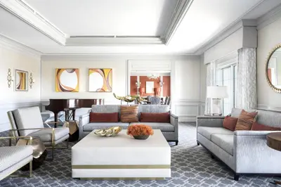 a living room with couches and a piano at The Ritz-Carlton, Marina del Rey in Los Angeles