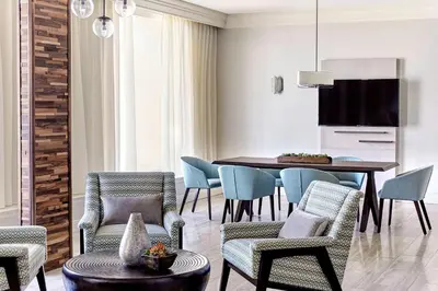 a dining room with a table and chairs at Los Angeles Airport Marriott in Los Angeles