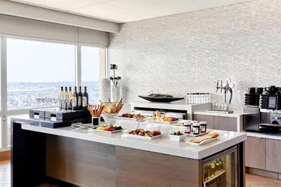 a kitchen with several plates of food on a counter at Los Angeles Airport Marriott in Los Angeles
